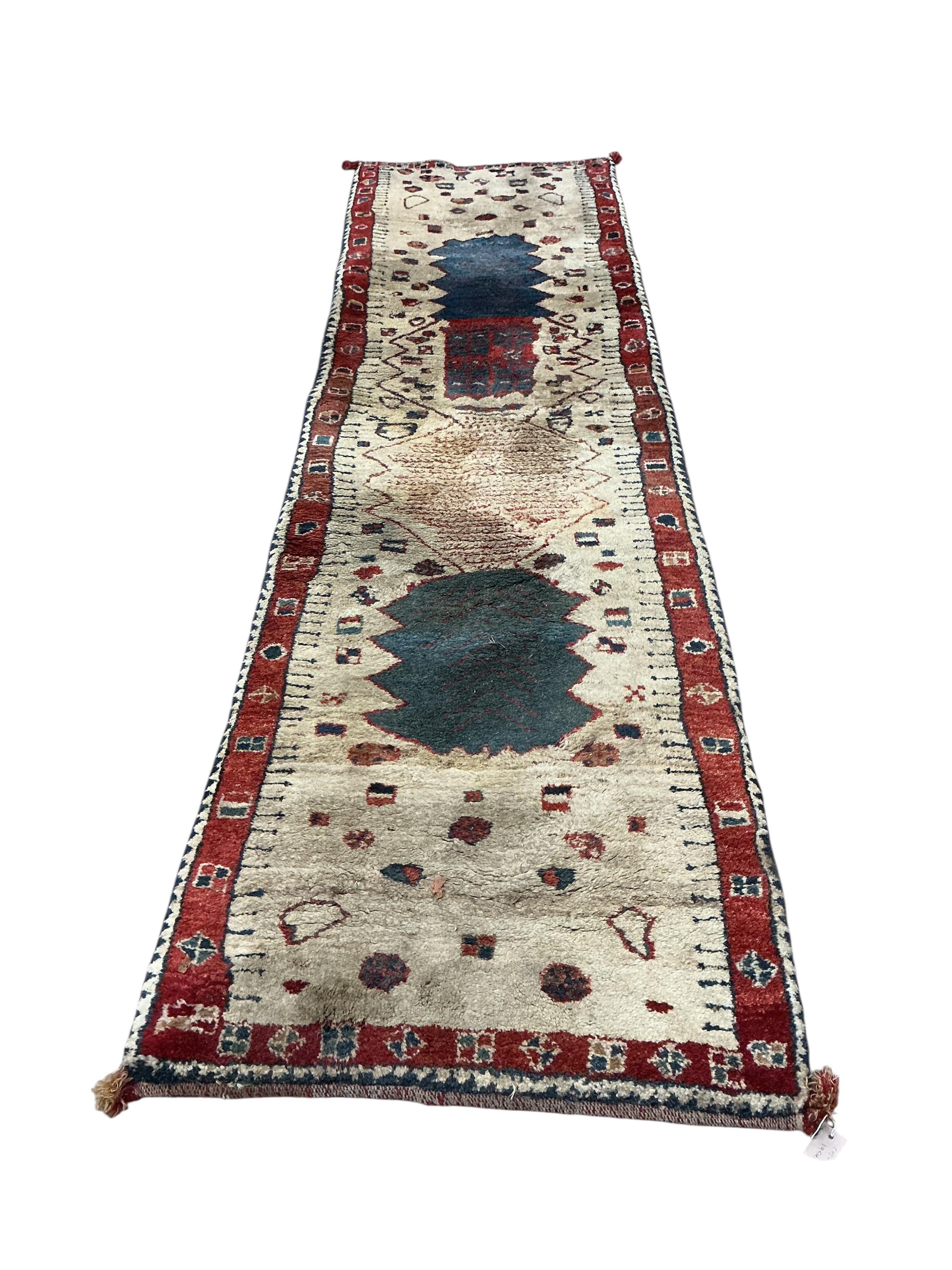 A Turkish runner, 292 x 82cm